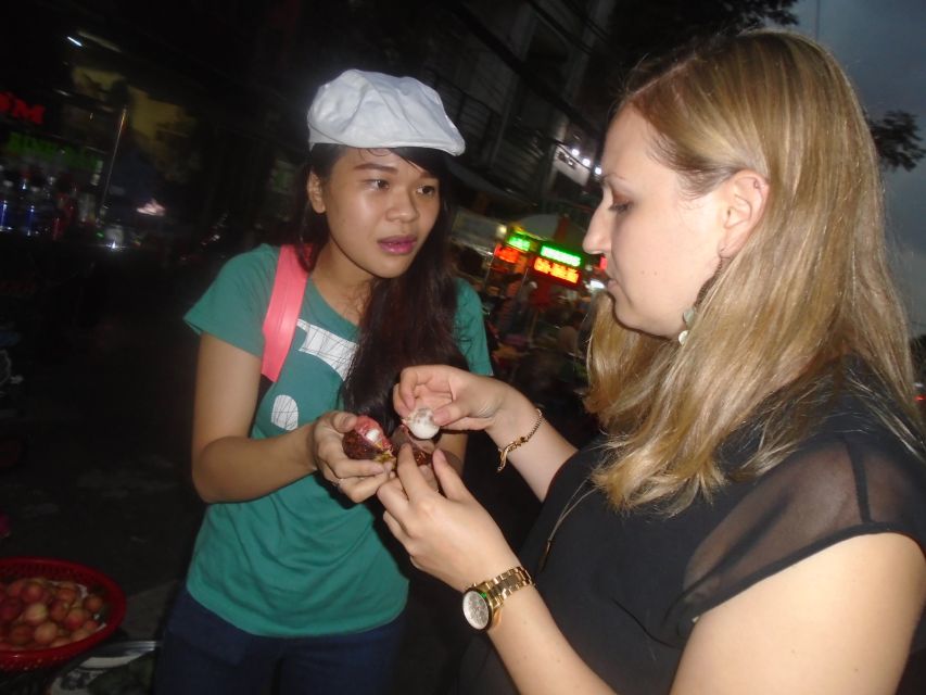 Midnight Street Food Tour In Saigon By Motorbike - From old mafia district to baguette and seafood
