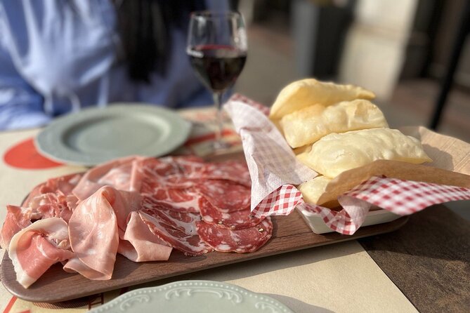 Milan's Authentic Street Food tour: A Gourmet Experience - The first tasting: vinegar, cured meats, and cheese