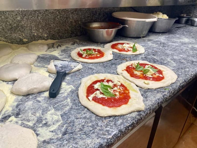 Naples: Old City Center Street Food Tour with Spritz - Via di San Gregorio Armeno and its famous craft shops