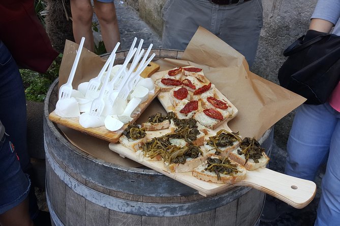 Naples Street Food Tour: Discover Local Flavors with Expert Guide - Piazza Bellini begins the walk with ancient Naples