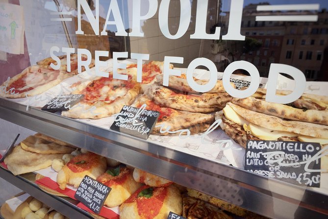 Naples' Ultimate Street Food Tour - Small Group by Do Eat Better - Folding pizza on Via dei Tribunali