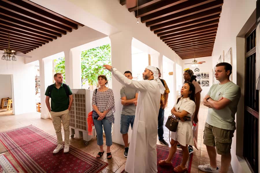 Old Dubai Guided Tour With Photographer: Souks & Street Food - Starting with coffee and dates at Al Khayma Heritage House