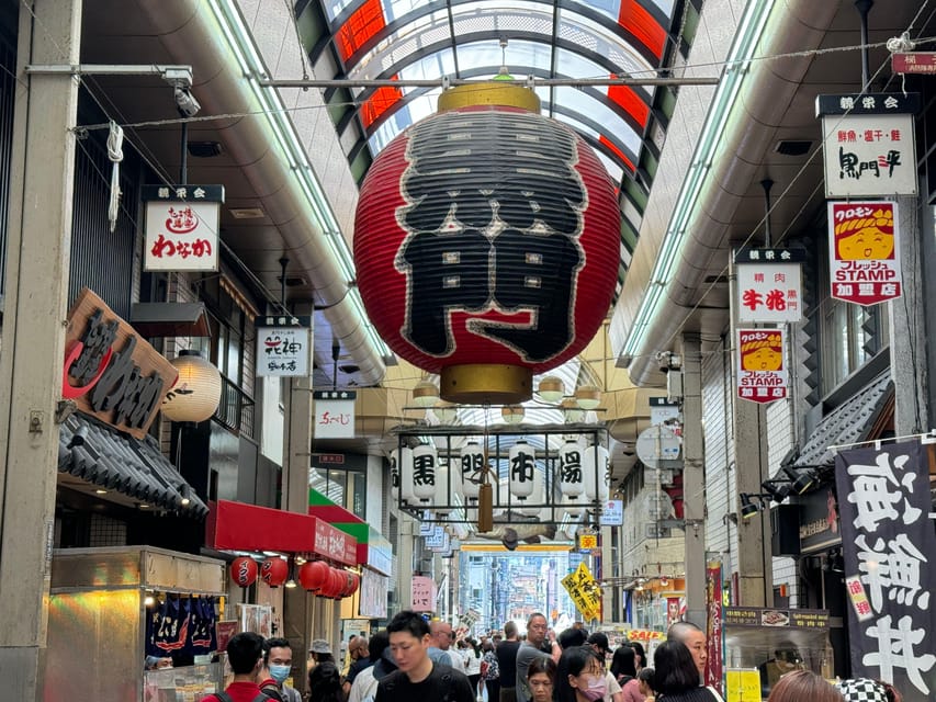 Osaka: Kuromon Market 1.5-Hour Seafood & Street Food Tour - The first market tasting: learning what to look for