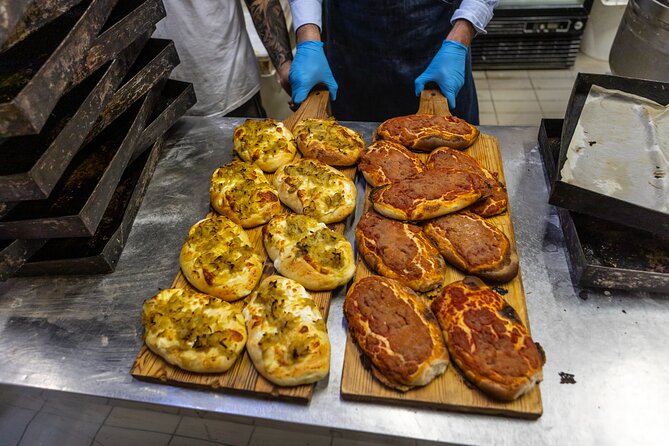 Palermo Street Food & Market Tour by Eating Europe - Entering Ballarò through the Arch of Cutò
