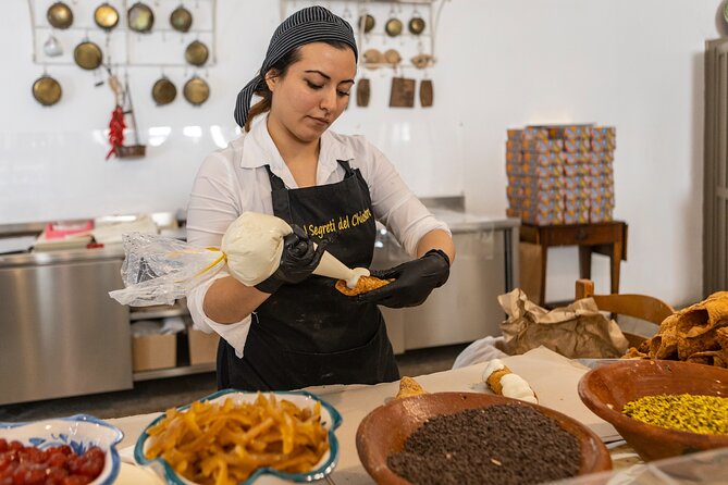 Palermo Street Food & Market Tour by Eating Europe - Fresh cannolo at I Segreti del Chiostro