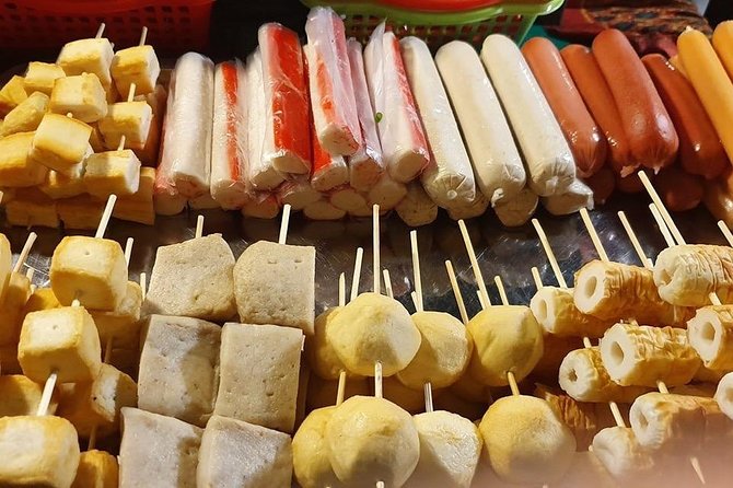 Phnom Penh Nightlife Street Food Tours - Kandal Market: grilled food near the river