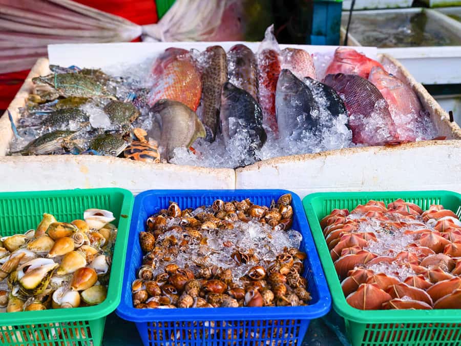 Phuket: Sunset View and Seafood Market Dinner Guided Tour - Phromthep Cape and the first sunset drink