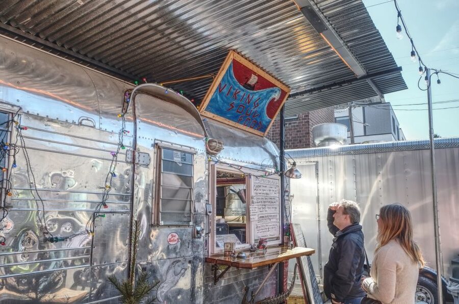 Portland: Food Carts of the Eastside Bike Tour - Getting fitted near Portland’s industrial district