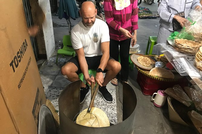 Private Ho Chi Minh Street Food Tour by Motorbike with Ao Dai Female Rider - Ho Thi Ky Flower Market and grilled rice paper