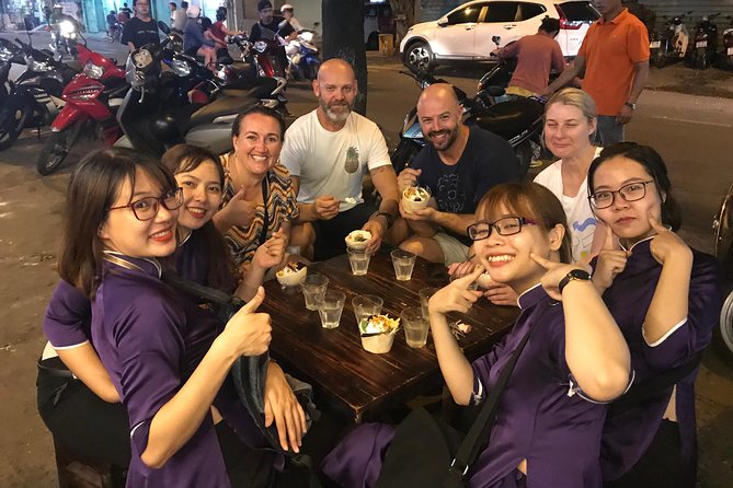 Private Ho Chi Minh Street Food Tour by Motorbike with Ao Dai Female Rider - Hotel pickup and the first ride through the city