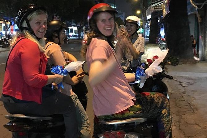 Private Saigon Street Food Tour with Motorbike - Stop two: grilled beef wrapped in betel leaf