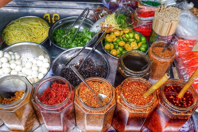 Private Saigon Street Food Tour with Motorbike - Stop four: snails and seafood in local style