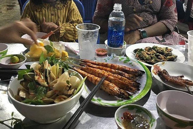 Private Saigon Street Food Tour with Motorbike - Stop one: rice paper salad and tropical fruit drinks