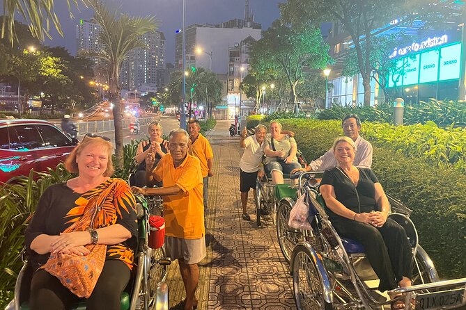 Private Street Food Discovery by Cyclo at Night in Ho Chi Minh - A slow ride through fast-moving Saigon