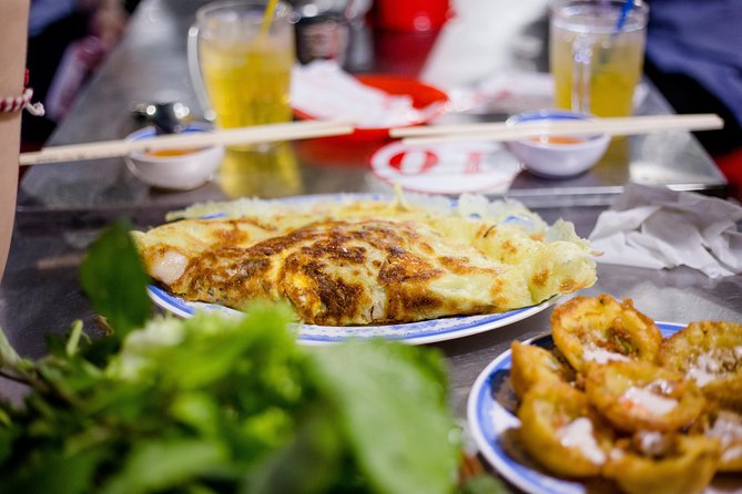 Private Street Food Motorbike Tour in Ho Chi Minh City - District 10: Flowers, night markets, and the city after work