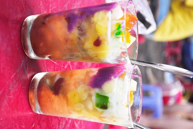 Private Street Food Tour by Scooter in Ho Chi Minh City - Nguyen Thien Thuat apartment buildings and old Saigon