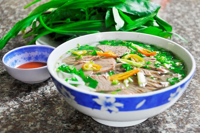 Private Street Food Tour by Scooter in Ho Chi Minh City - Starting at the Saigon Opera House
