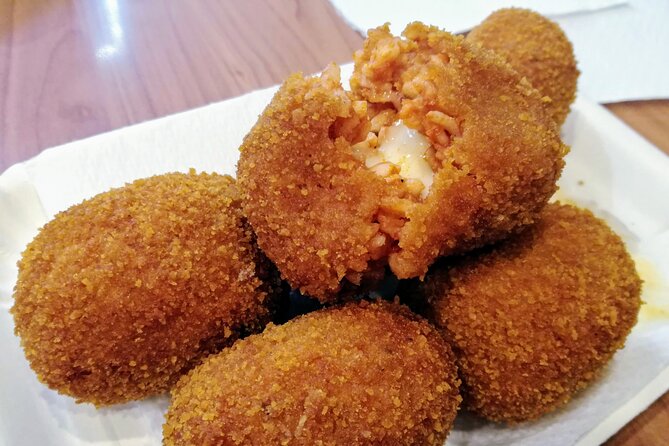 Rome Street Food Tour - History, Craft and Authentic Taste - Campo de’ Fiori brings history and supplì