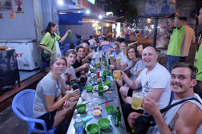 Saigon After Dark and Street Food by Motorbike and Scooter - District 4 and the BBQ seafood finale