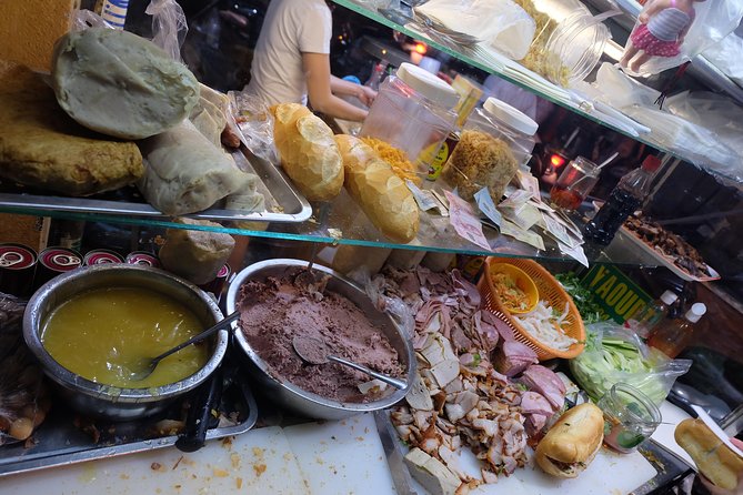 Saigon After Dark and Street Food by Motorbike and Scooter - What the $37 price really covers