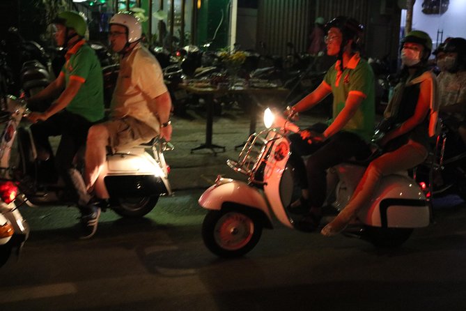 Saigon After Dark Vespa Street Food Tour + Live Music 4 hours - Seafood first, with the city rushing past