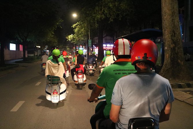 Saigon After Dark Vespa Street Food Tour + Live Music 4 hours - Banh xeo and nem lui in a local food stop