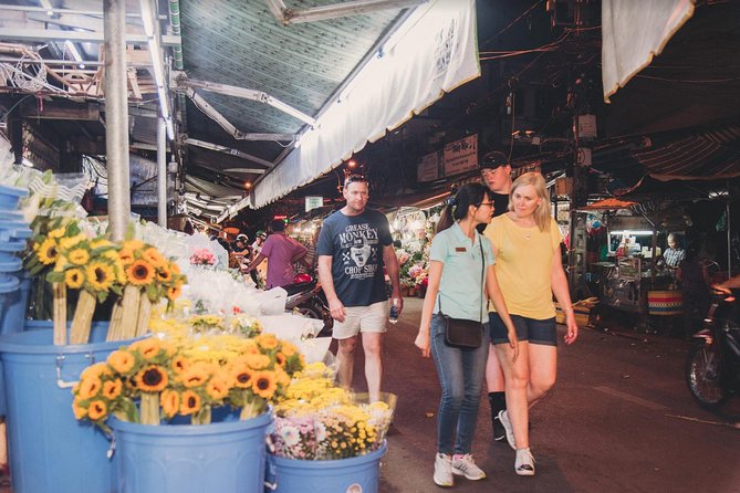 Saigon Authentic Walking Street Food Tour 12+ Tastings Included - The night flower market adds a change of color
