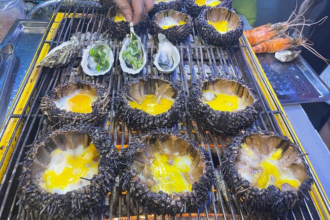 Saigon By Night and Street Food By Motorbike | Opt: Ao Dai Riders - Nguyen Trai Street, where the city keeps moving