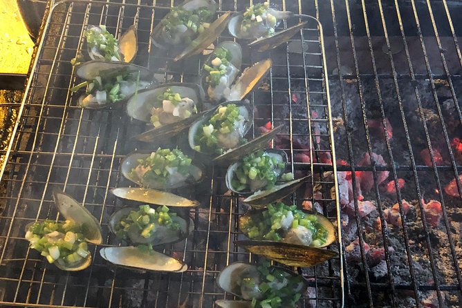 Saigon By Night and Street Food By Motorbike | Opt: Ao Dai Riders - District 4 and the final food stop