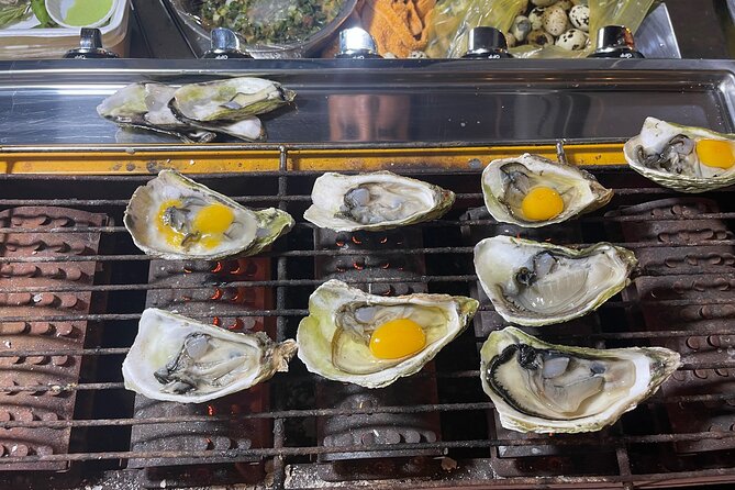 Saigon By Night and Street Food By Motorbike | Opt: Ao Dai Riders - How much food do you actually get?