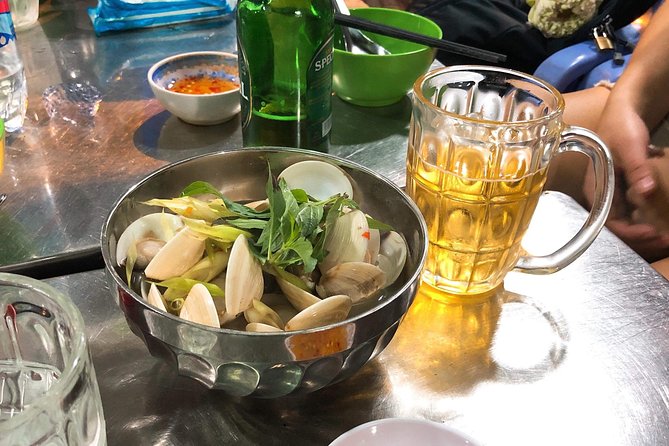 Saigon By Night and Street Food By Motorbike | Opt: Ao Dai Riders - 5:30 PM pickup and the first taste of Saigon