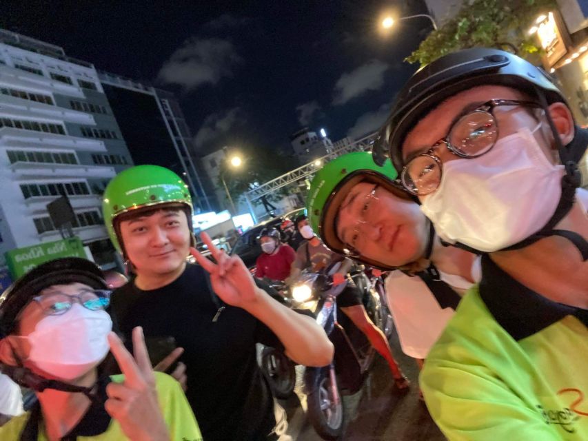 Saigon: Night Sightseeing And Street Food Tour By Vespa - Seafood, snails, oysters, and a local beer
