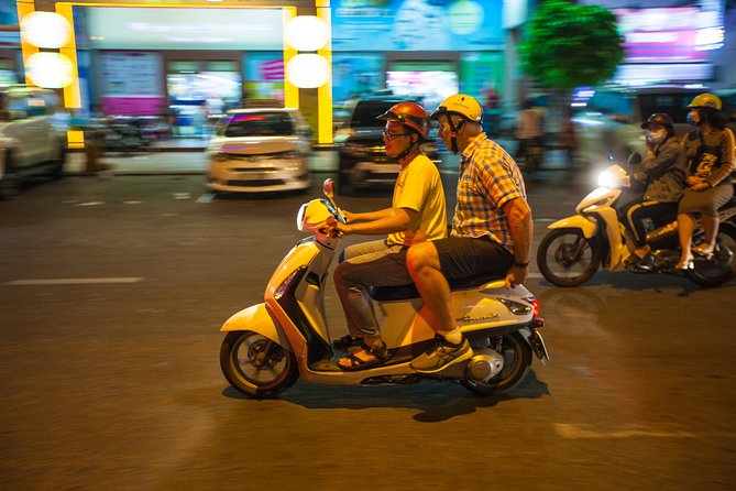 Saigon Night Street Food and City Tour on Scooter - A short sightseeing ride through the illuminated city