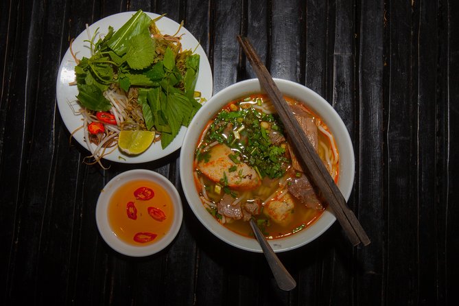 Saigon Night Street Food and City Tour on Scooter - What the $65 price really covers
