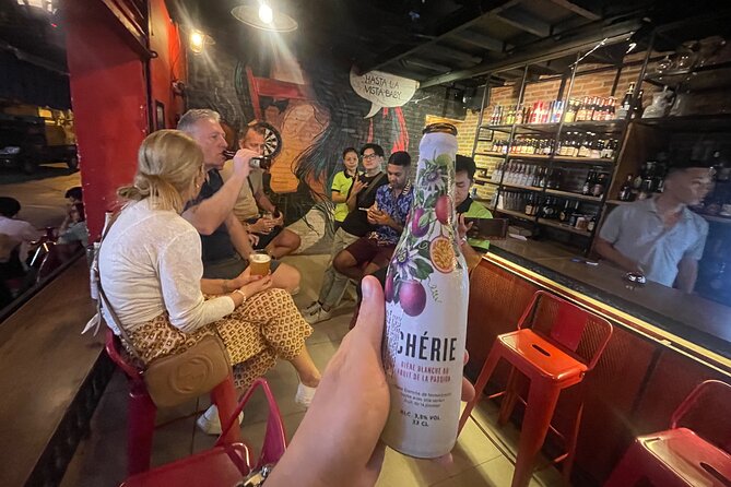 Saigon Night Street Food and Craft Beer Tour by Vespa Scooter - Nguyen Thien Thuat and Saigon’s older apartment life