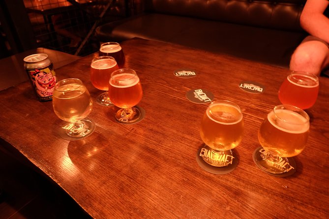 Saigon Night Street Food and Craft Beer Tour by Vespa Scooter - The craft beer bar and its two pours