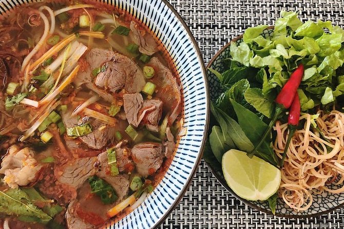 Saigon's Hidden Flavors - Private Street Food Walk with Local Students - Tasting 2: Grilled pork with rice noodles