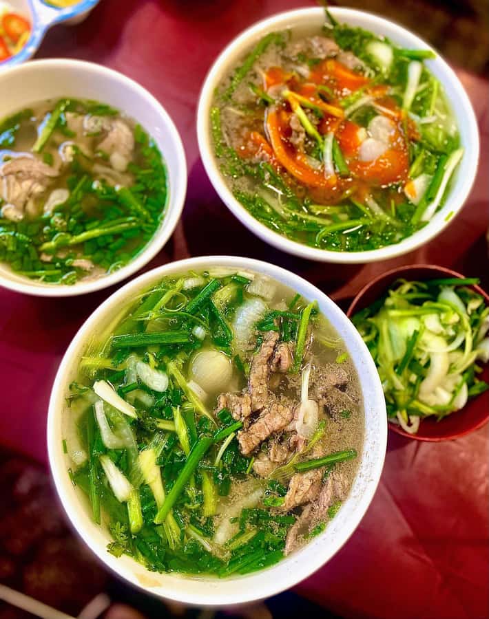 Saigon: Street Food Discovery & Local Culinary Journey - Sweet and savory contrasts: grilled banana and bánh mì