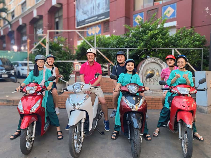 Saigon: Street Food Tasting & Sightseeing Tour by Motorbike - District 10 brings grilled banana and coconut sauce