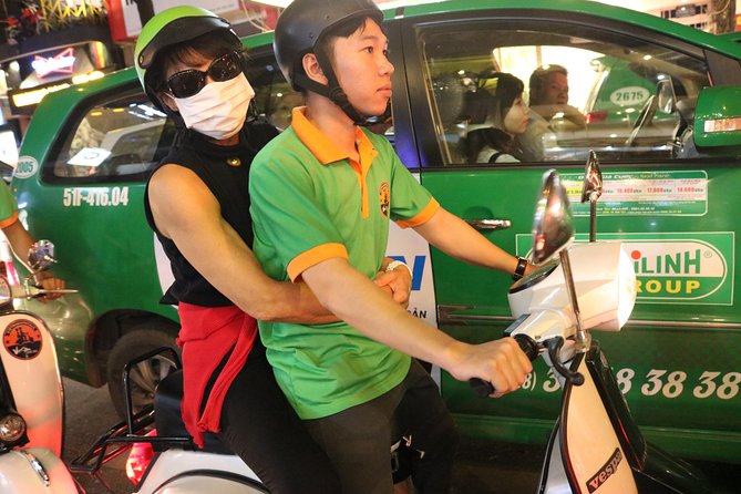 Saigon Vespa By Night Street Food Tour 4,5 Hours - Seeing Saigon from the back seat