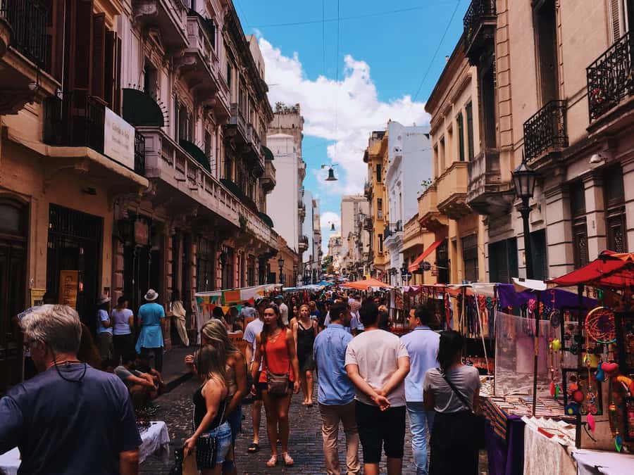 San Telmo: Historical Guided Tour with Street Food & Drinks - Cobblestone streets and the story of old Buenos Aires