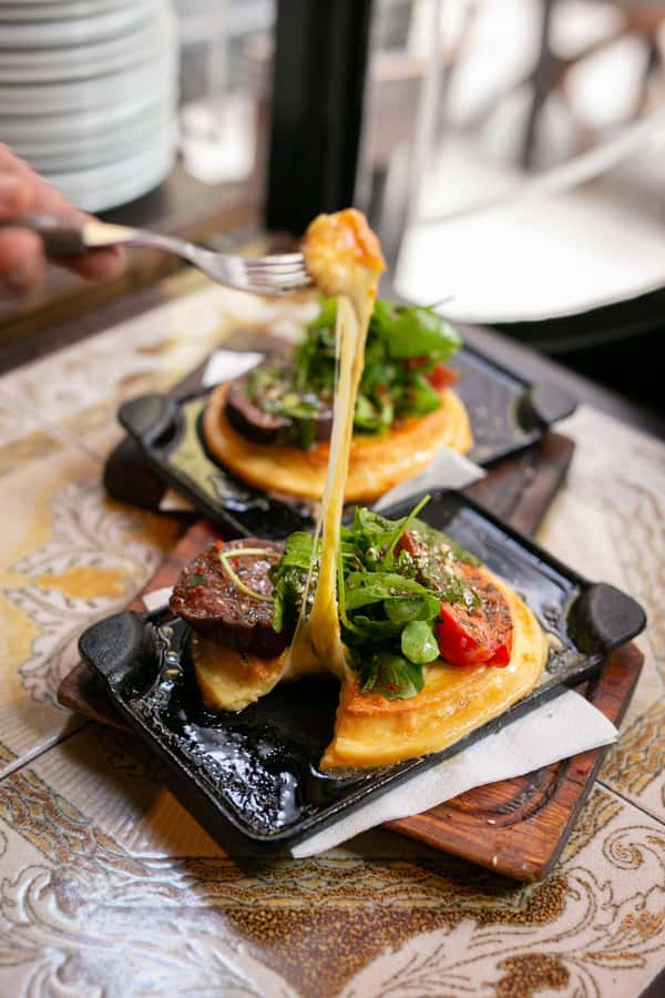 San Telmo: Historical Guided Tour with Street Food & Drinks - Finishing with a traditional Argentine dessert