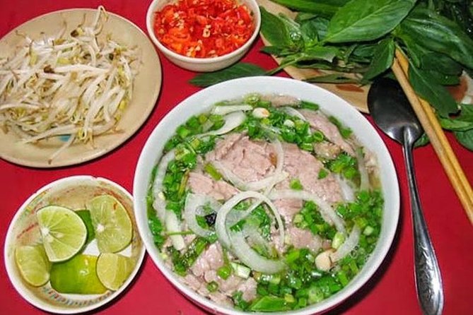 Small Group Hanoi Street Food Walking Tour with Local Guide - The motorbike pickup point to clarify