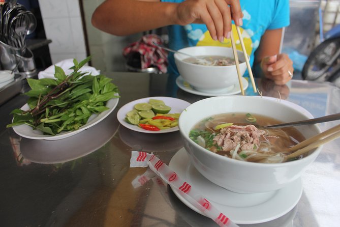Small-group Street Food Lover by Motorbike (04 hours) - Pickup, timing, and the first ride