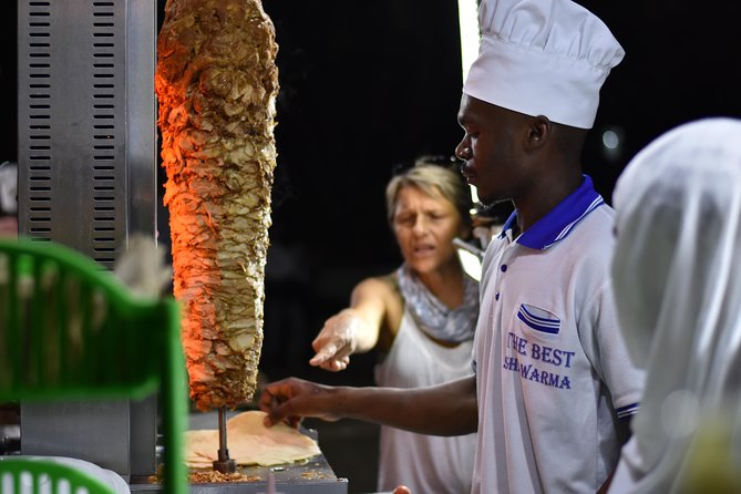 Stone Town Evening Walk Tour With Visit Food Markets - Timing, meeting details, and cancellation