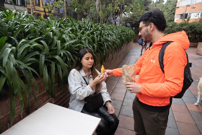 Street Food Tour in Bogotá with Tastings - Plaza de Toros and Torres del Parque: food with a city backdrop