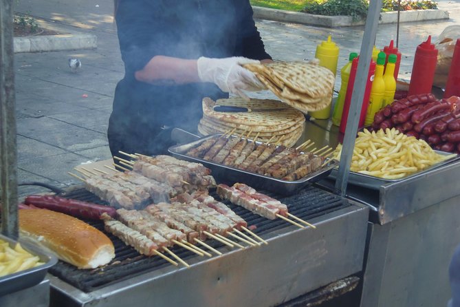 Street Food Tour - Sample the Food the Locals Love - Greek pie in the old commercial center