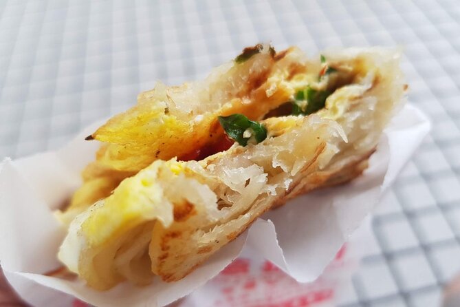Taipei Hidden Eats, Market & Street Food Tour with 8+ Tastings - Yongkang Street brings the route into a food hub