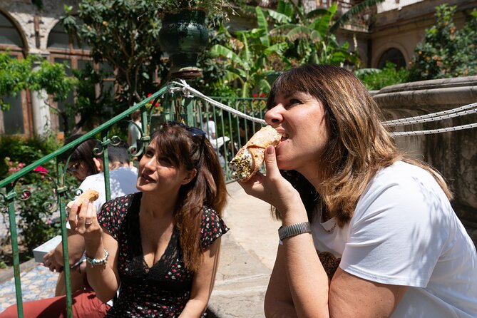 Taormina: Sicilian Street Food & Wine Tour by Do Eat Better - Arancino beside Taormina’s Ancient Theatre