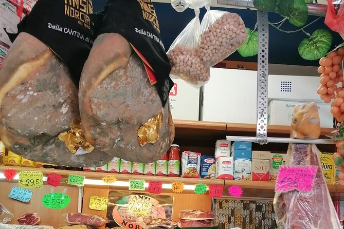 Testaccio Street Food Tour Eat Like a Local - The Pyramid of Cestius adds an unusual Roman finale